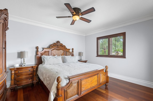 bedroom with ornamental molding, dark wood-type flooring, and ceiling fan