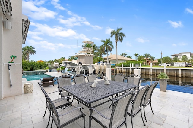 view of patio / terrace with a water view