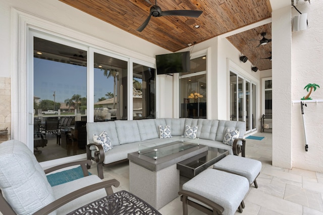 view of patio / terrace featuring an outdoor living space and ceiling fan