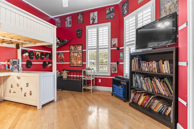 bedroom with light hardwood / wood-style floors