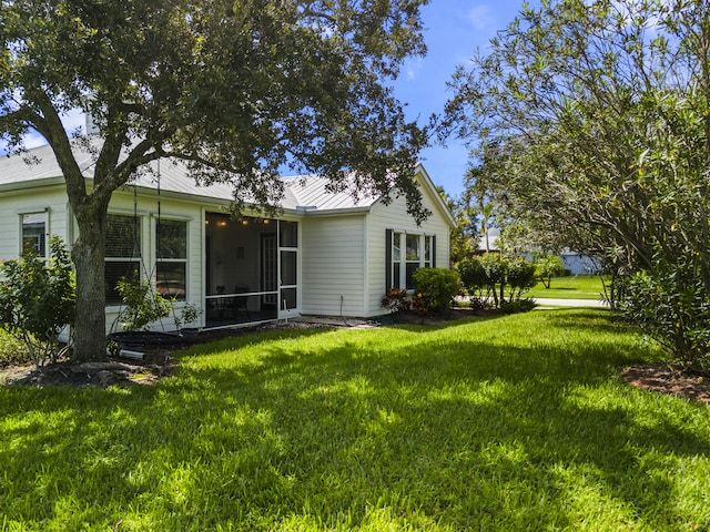 exterior space featuring a lawn