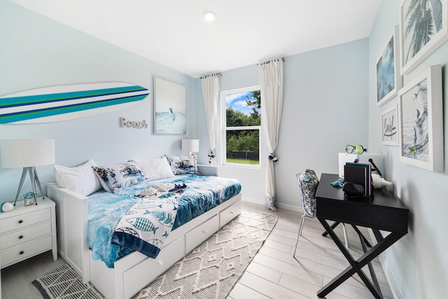 bedroom with light hardwood / wood-style flooring