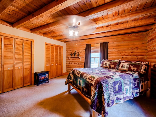 carpeted bedroom with beamed ceiling, wooden ceiling, and log walls