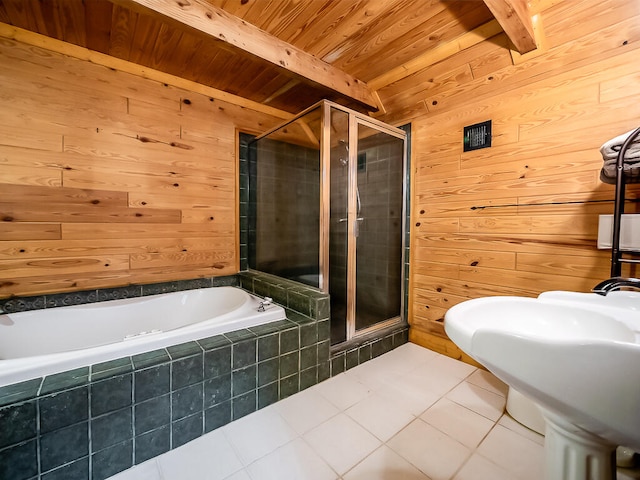 bathroom featuring beamed ceiling, wood walls, independent shower and bath, wooden ceiling, and tile patterned flooring