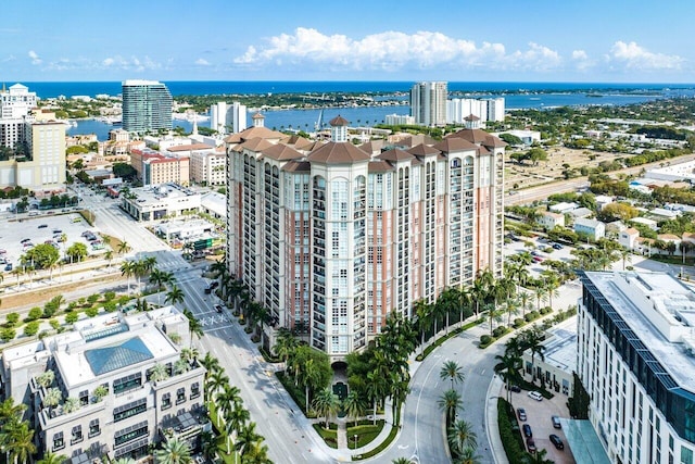 birds eye view of property with a water view