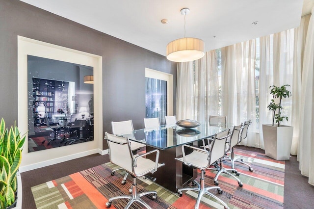 view of carpeted dining area