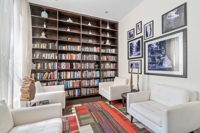 sitting room with built in shelves