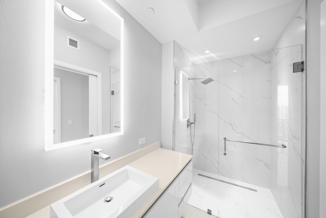 3100 N Ocean Dr Unit H-1508, Singer Island, FL 33404 - full bath with a marble finish shower, vanity, and recessed lighting