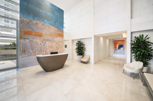 3100 N Ocean Dr Unit H-1508, Singer Island, FL 33404 - building lobby featuring a high ceiling