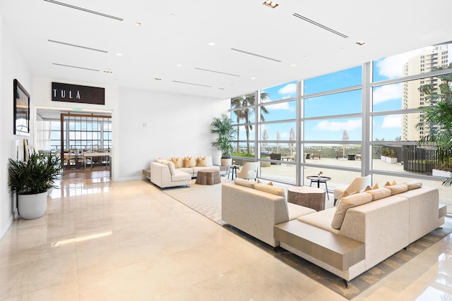 3100 N Ocean Dr Unit H-1508, Singer Island, FL 33404 - lobby featuring a towering ceiling and floor to ceiling windows