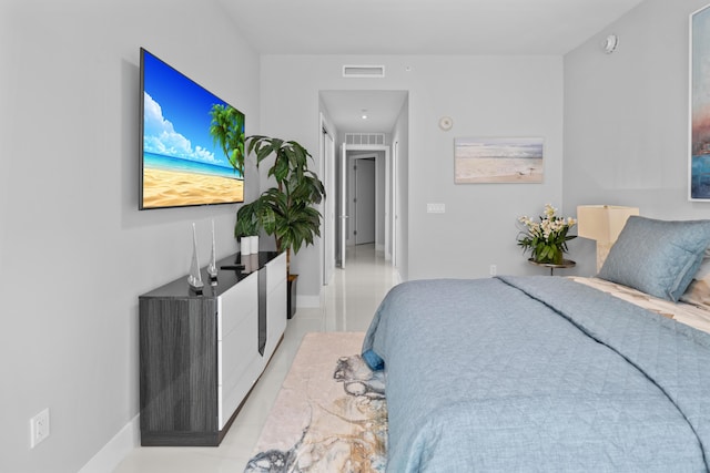 3100 N Ocean Dr Unit H-1508, Singer Island, FL 33404 - bedroom featuring light tile patterned floors and baseboards