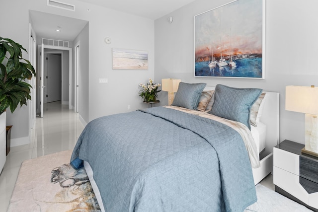 3100 N Ocean Dr Unit H-1508, Singer Island, FL 33404 - tiled bedroom featuring baseboards