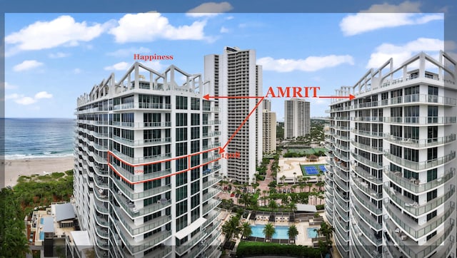 3100 N Ocean Dr Unit H-1508, Singer Island, FL 33404 - view of building exterior with a water view and a view of city