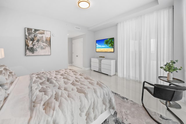 3100 N Ocean Dr Unit H-1508, Singer Island, FL 33404 - tiled bedroom featuring baseboards