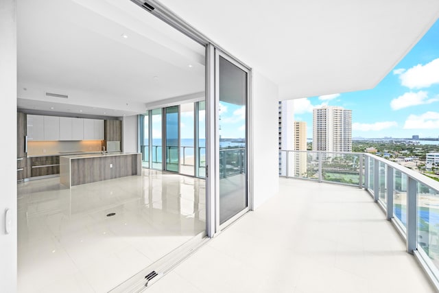 3100 N Ocean Dr Unit H-1508, Singer Island, FL 33404 - balcony featuring a view of city and an outdoor kitchen