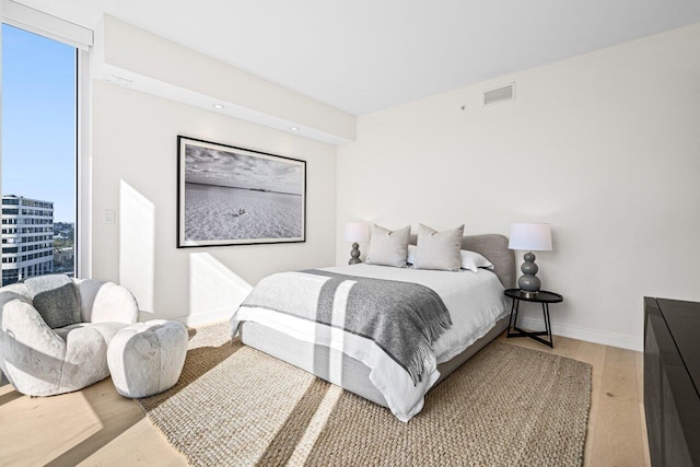 bedroom featuring light hardwood / wood-style floors