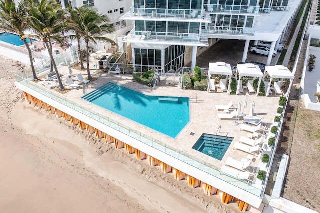 view of swimming pool featuring a patio area