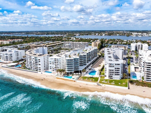 aerial view with a view of the beach and a water view