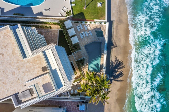 bird's eye view featuring a view of the beach and a water view