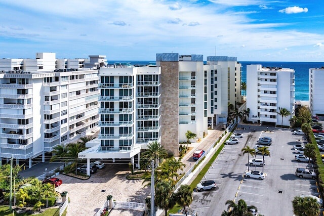 view of property with a water view