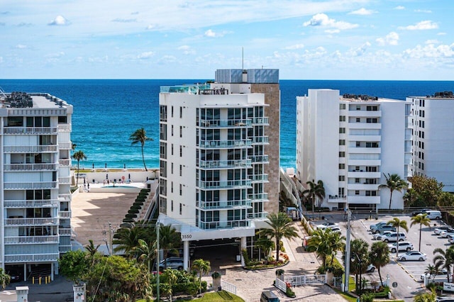 view of building exterior featuring a water view