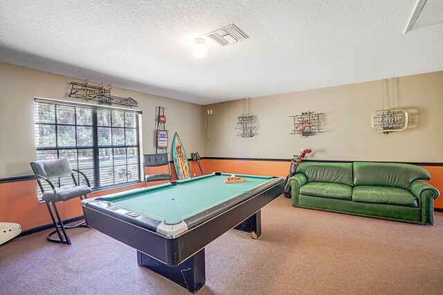 recreation room with visible vents, carpet floors, a textured ceiling, and pool table