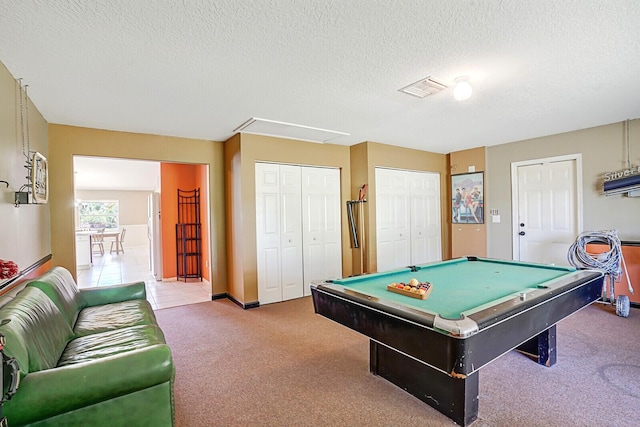 game room with visible vents, pool table, carpet, attic access, and a textured ceiling