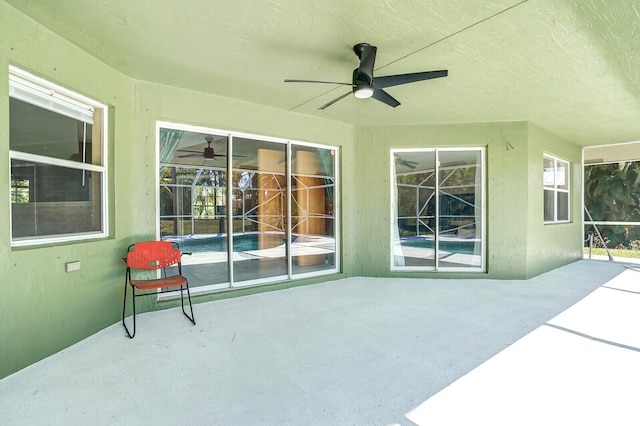 view of patio with a ceiling fan