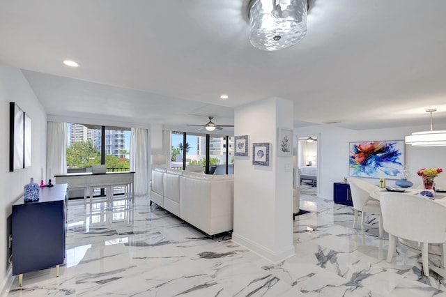 living room featuring ceiling fan