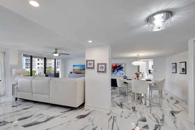 living room with ceiling fan