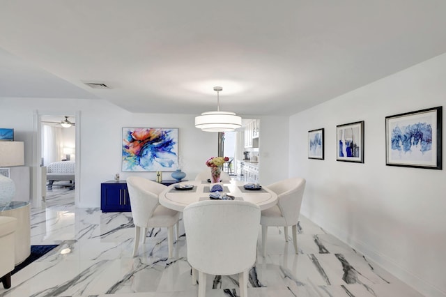 dining area with ceiling fan