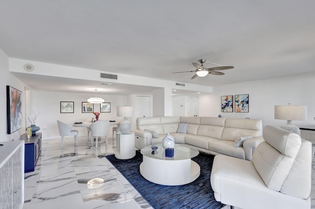 living room with ceiling fan