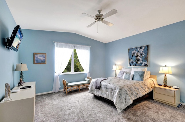 carpeted bedroom featuring vaulted ceiling and ceiling fan