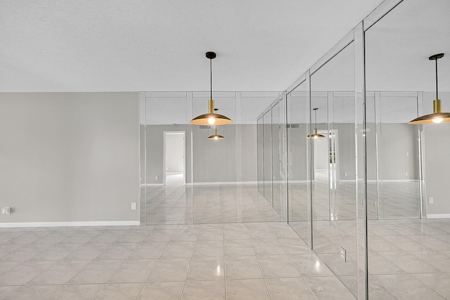 interior space featuring a textured ceiling