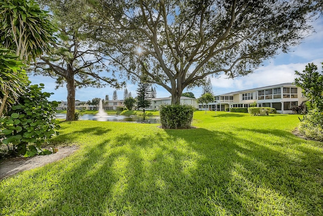 view of yard featuring a water view