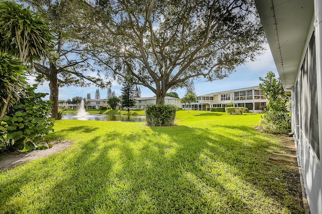 view of yard featuring a water view