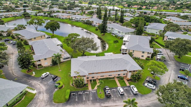 drone / aerial view with a water view