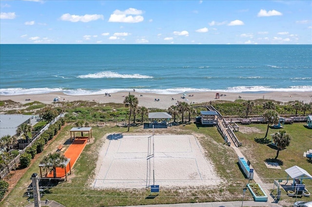 bird's eye view with a beach view and a water view