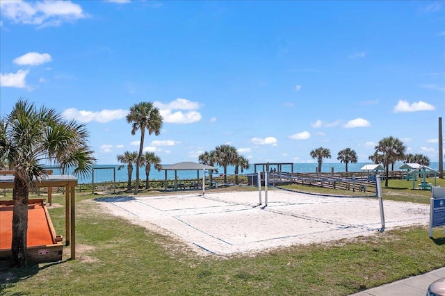 view of home's community featuring volleyball court, a gazebo, and a lawn