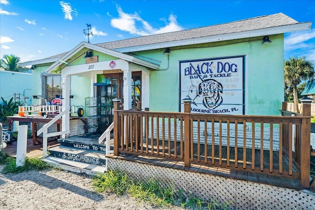 view of front of property with a deck