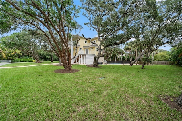 view of yard featuring fence
