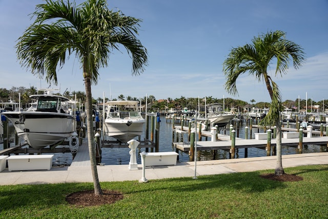 dock area featuring a water view and boat lift