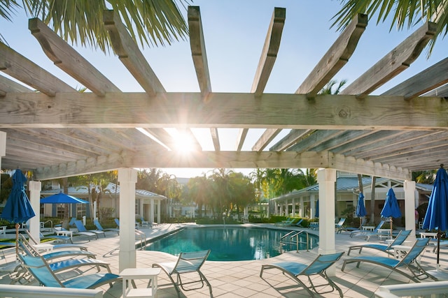 community pool with a patio