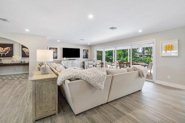 living room featuring light wood-type flooring