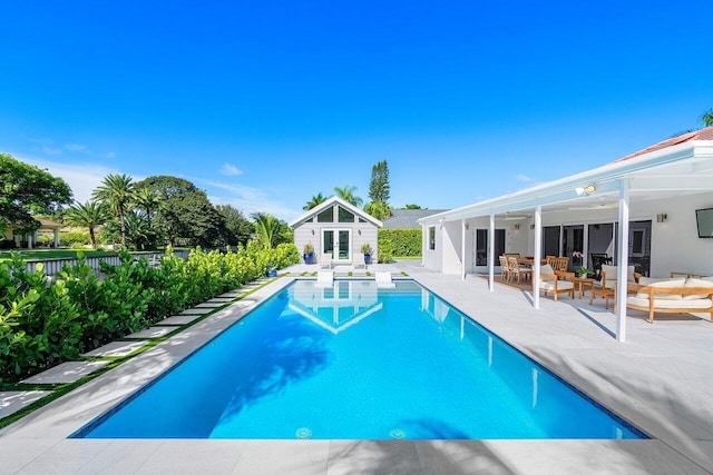 view of pool featuring a patio and outdoor lounge area