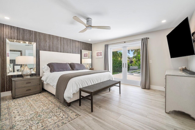 bedroom with french doors, light hardwood / wood-style flooring, access to exterior, and ceiling fan