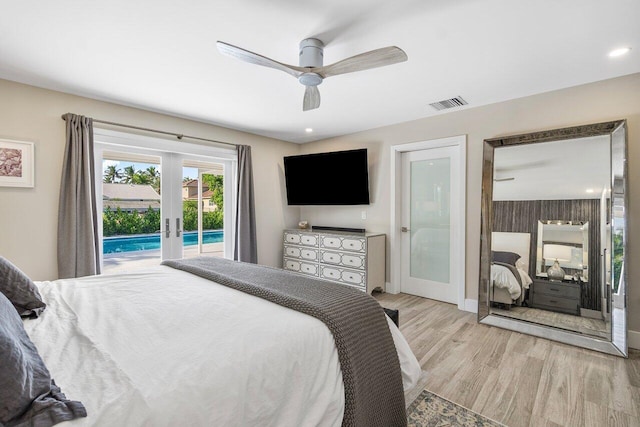 bedroom featuring french doors, light hardwood / wood-style flooring, access to outside, and ceiling fan