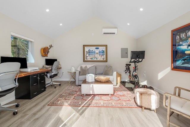 office with high vaulted ceiling, a wall mounted AC, electric panel, and light wood-type flooring