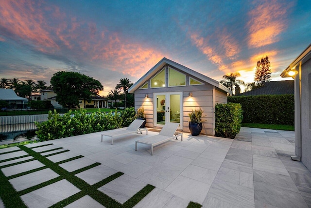 view of patio terrace at dusk