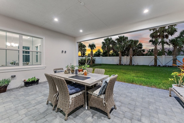 patio terrace at dusk with a yard